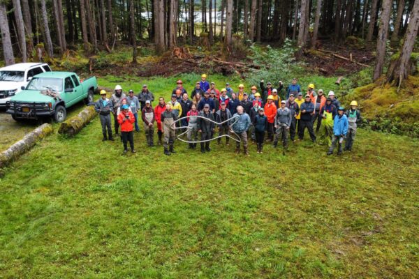 In the summer of 2023, over fifty participants representing tribal communities, NGOs, and other organizations attended a restoration workshop, hosted by the Forest Service, on large woody habitats gathered on Prince of Wales Island (Alaska) (©Khrystl Brouillette-Gillam).